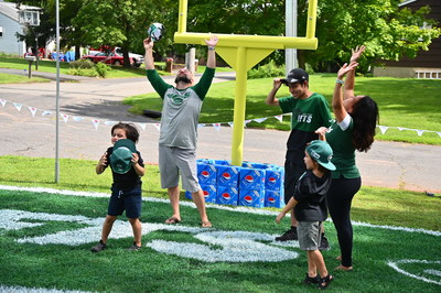 Cindy and Family Celebrate After Winning Pepsi Homegate The Ultimate At Home Tailgating Experience (Photo by Theo Wargo/Getty Images for Pepsi)