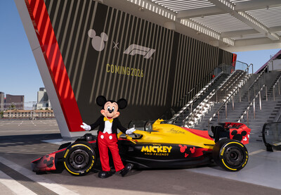 Mickey Mouse poses in front of a Disney x F1 race car at the Grand Prix Plaza in Las Vegas on May 19 to celebrate the official collaboration announcement. (Tony Rodriguez, photographer)