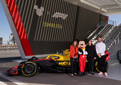 President of Disney Consumer Products, Tasia Filippatos, Mickey Mouse, Chief Commercial Officer of Formula 1, Emily Prazer,and former F1 driver Romain Grosjean, pose in front of a Disney x F1 race car at the Grand Prix Plaza in Las Vegas on May 19 to celebrate the official collaboration announcement. (Tony Rodriguez, photographer)