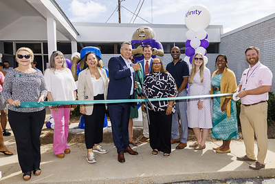 Comcast unveil two new peanut sculptures outside the Oates Street Xfinity Store in Dothan, AL on Wednesday, Oct. 8, 2025. These new peanut sculptures join more than 100 others as part of Dothan’s iconic “Peanuts Around Town” public art project.