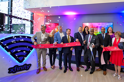 West Palm Beach Mayor Keith James cuts the ribbon at Comcast's new Florida Region headquarters.
