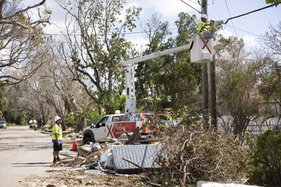 Comcast field technicians work to restore information services to people who lost service during Hurricane Milton, in Sarasota, Fla., Sunday, Oct. 13, 2024 (Erik Kellar/Comcast via AP Content Services)