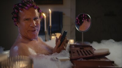 Will Ferrell rocks hair curlers as he checks out with PayPal from the bathtub.