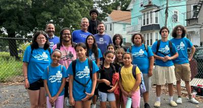 Washington Trust recently partnered with the Episcopal Conference Center of RI to support their City Camp program, which provides free week-long summer camp programs for 150 youth, aged 6-12, from Olneyville. Pictured are City Camp staff and participants joined by Washington Trust's Rolando Lora, Executive Vice President of Retail Lending and Community Lending Officer, Edward O. 