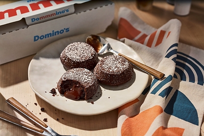 In celebration of Domino's 65th birthday, the brand is offering customers a special deal: free Chocolate Lava Crunch Cakes with any online order of at least $10 between Dec. 8-22.