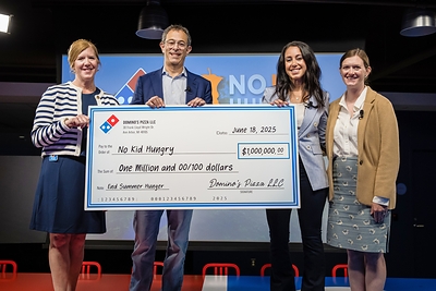 Domino’s has made a three-year, $1 million commitment to No Kid Hungry to help expand summer meal access for kids across the U.S. Pictured, from left to right: Maureen Pittenger, Domino’s EVP-chief human resources officer; Russell Weiner, Domino’s CEO; Sara Jamshidi, Share Our Strength senior director of corporate partnerships; and Jeannette Sharp, Domino’s manager of community relations.