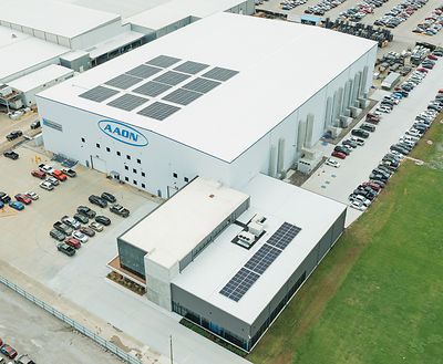 Aerial view of solar panels on top of the NAIC and Exploration Center at AAON's Headquarters.