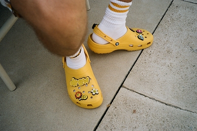The Crocs X Justin Bieber with drew Classic Clog pulls inspiration from the signature yellow of Bieber’s personal clothing brand, drew house, and includes eight custom Jibbitz™ charms designed to match his good vibes and laid-back style.