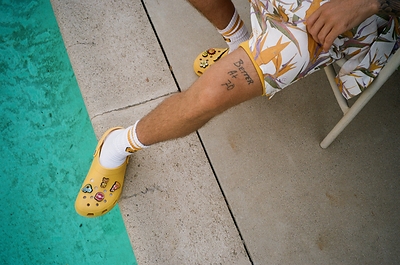 The Crocs X Justin Bieber with drew Classic Clog pulls inspiration from the signature yellow of Bieber’s personal clothing brand, drew house, and includes eight custom Jibbitz™ charms designed to match his good vibes and laid-back style.