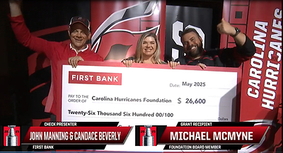 First Bank Scores Big for Local Youth: Donates $26,600 to the Hurricanes Foundation Following Thrilling Season Partnership