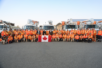 Hydro One crews joined by Teri French, Executive Vice President, Safety, Operations and Customer Experience, Hydro One, Stephen Lecce, Minister of Energy and Electrification and Sam Oosterhoff, Associate Minister of Energy-Intensive Industries this morning near Niagara border before driving to Georgia to help restore power after Hurricane Helene. (CNW Group/Hydro One Inc.)