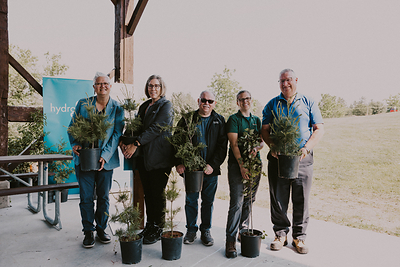 From left to right: Councillor Joy Lachica, Chair, Environment and Climate Change Portfolio, City of Peterborough; Teri French, Executive Vice President, Operations and Customer Experience, Hydro One; Councillor Keith Riel, Ashburnham Ward; Leighanne Howard, Urban Forest Program Manager, City of Peterborough; Deputy Mayor Gary Baldwin, City of Peterborough. (CNW Group/Hydro One Inc.)
