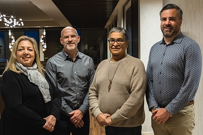 Chief Whitecloud, Andrew Spencer, Hydro One, Ogichidaa (Grand Chief) Francis Kavanaugh and Matthew Jackson, Hydro One celebrate the signing of the agreement in Thunder Bay. (CNW Group/Hydro One Limited)