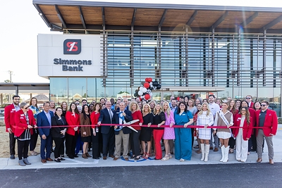 Simmons Bank associates celebrate the grand opening of the Caraway branch with the Jonesboro Regional Chamber of Commerce.