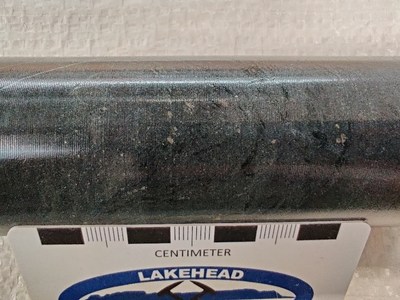 Figure 1 – Hole NES21-01 Pentlandite + Pyrrhotite in serpentinized dunite. 
Core sample at 316.5 metres, microscope photos at 321 and 326.5 metres, core sample at 352 metres (CNW Group/Canada Nickel Company Inc.)