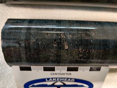 Figure 1 – Hole NES21-01 Pentlandite + Pyrrhotite in serpentinized dunite. 
Core sample at 316.5 metres, microscope photos at 321 and 326.5 metres, core sample at 352 metres (CNW Group/Canada Nickel Company Inc.)