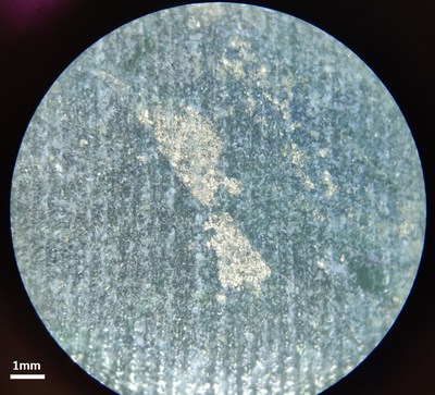 Figure 1 – Hole NES21-01 Pentlandite + Pyrrhotite in serpentinized dunite. 
Core sample at 316.5 metres, microscope photos at 321 and 326.5 metres, core sample at 352 metres (CNW Group/Canada Nickel Company Inc.)