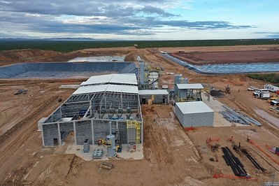 Figure 2: Merrill-Crowe Plant (front centre), Pregnant Pond (back left), Heap Leach Pad (back right) (CNW Group/Orla Mining Ltd.)