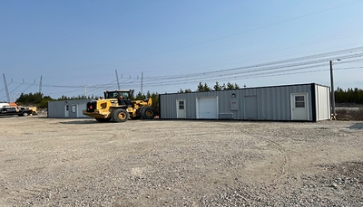 Figure 4: First two logging containers in place at the Nisk project (CNW Group/Power Metallic Mines Inc.)