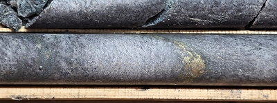 Figure 2: Example of minor Cu mineralization in PN-24-090 drill core that led to BH EM discovery in PN-24-094 (CNW Group/Power Nickel Inc.)