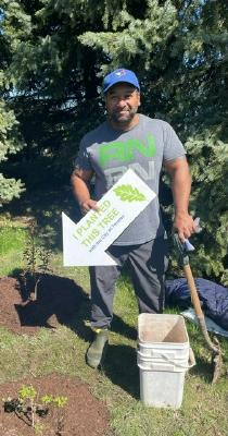 Volunteers and team members, including MCAN's Duane Chanderbhan, take part in a tree planting event at Goldhawk Park in April 2024. (CNW Group/MCAN Mortgage Corporation)
