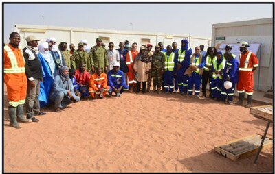 Figure 7: Mines Minister Delegation and SOMIDA Team (CNW Group/Global Atomic Corporation)