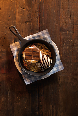 Cracker Barrel's new S’mores Brownie Skillet features a rich chocolate brownie topped with a roasted marshmallow and a HERSHEY’S Milk Chocolate Bar – all served warm over crumbled graham crackers and a scoop of vanilla ice cream.