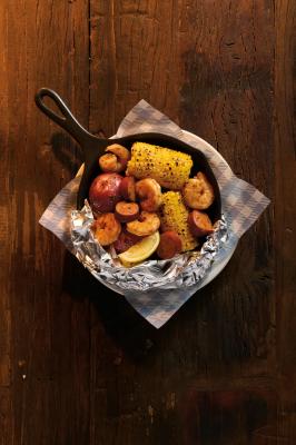 Cracker Barrel invites guests to savor the summer with the return of the beloved Campfire Meals – including the all-new Campfire Shrimp Skillet, featuring grilled shrimp and andouille sausage, cooked in a buttery broth with campfire-seasoned corn and potatoes, and is served sizzling in a cast iron skillet – available nationwide at participating restaurants for a limited time.