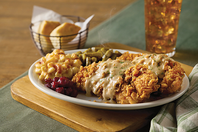 Country Fried Turkey: The popular guest favorite is back on the menu for a limited time. Tender turkey fillets, hand-breaded and fried 'til crispy and topped with creamy, herbed pan gravy. Served with a choice of two Country Sides, a sampling of cranberry relish, and homemade Buttermilk Biscuits or Corn Muffins. Available while supplies last.