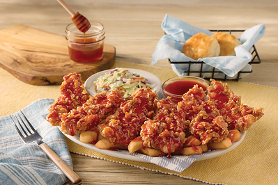 Cracker Barrel's crispy chicken tenders drizzled with the new Bee Sting sweet-heat honey glaze.