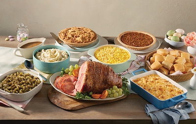 The Easter Heat n' Serve Ham Feast serves 8-10 and features spiral sliced Sugar-Cured Ham, Mashed Potatoes with Gravy, Sweet Yeast Rolls, choice of three Country Sides, and two pies. Availble for a limited time.
