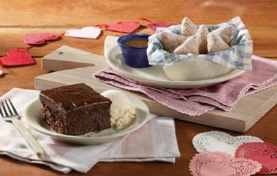 Celebrate with your special someone at Cracker Barrel this Valentine's Day and receive free dessert including Double Chocolate Fudge Coca-Cola Cake® or Biscuit Beignets with the purchase of two select entrees. Visit crackerbarrel.com for more details.