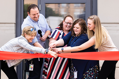 In Salt Lake City on July 12, 2021, Recursion Chief People Officer Heather Kirkby, Recursion Co-Founder & CEO Chris Gibson, PhD, Bright Horizons District Manager Erin Hagny, Bright Horizons Center Director Natalie Shumway, and Bright Horizons Health & Safety Director Olivia Chechelski celebrate the opening of Recursion's onsite child care center. (left to right)