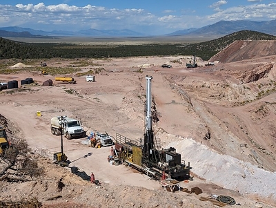 Figure 1. Photograph of recently mobilized core rig drilling south of the Atlanta Pit (CNW Group/Nevada King Gold Corp.)
