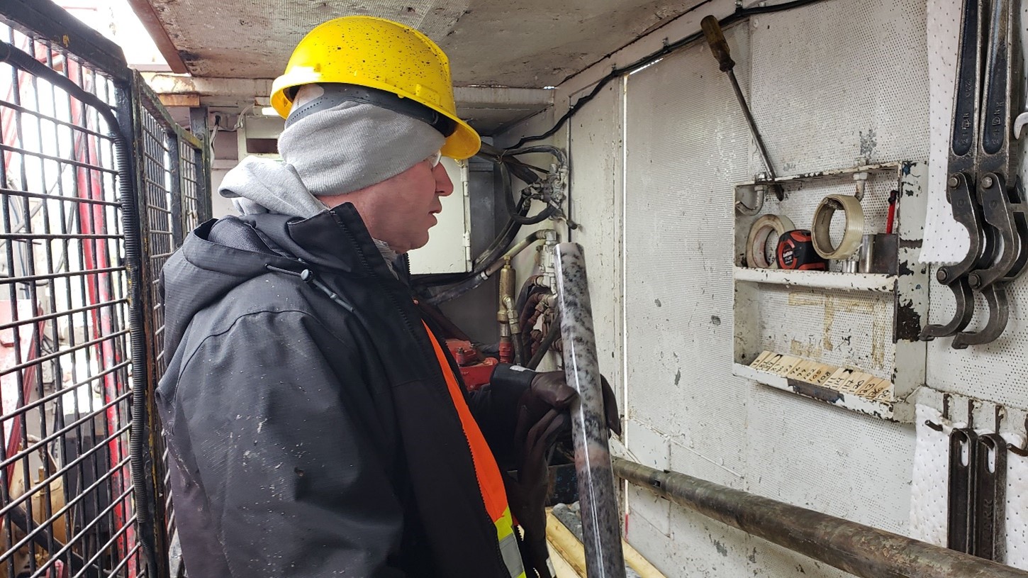 Figure 4 – Power Metals Corp CEO, Haydn Daxter reviewing core from the Main Zone currently being drilled (CNW Group/POWER METALS CORP)