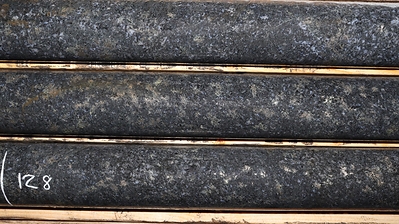 Photo 1: Typical ‘West Graham-style’ mineralization from hole WG-23-026. Core is NQ diameter measuring 47.6 millimetres. Photo is from a depth of 128 metres. (CNW Group/SPC Nickel Corp.)
