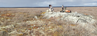 Image 3: North Arrow exploration team at the southeast end of the SD4 Pegmatite looking northeast, LDG Lithium Project, NT (CNW Group/North Arrow Minerals Inc.)