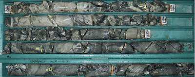 Figure 3: Great Pyramid diamond core (22GPRC021 138.20-142.80m), north of historic resource area. Grey to dark grey moderate sheeted and stockwork quartz-pyrite-sphalerite-cassiterite veining in silicified, fine-grained sandstones. This interval 138.2 to 142.0m returned 0.31% Sn and 1.02% Zn. (CNW Group/TinOne Resources Corp.)