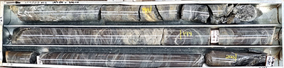Great Pyramid diamond core (22GPRC014 197.5-200.10m), beneath historic resource area, assay results pending. Intense sheeted quartz-carbonate ± sulphide veining in strongly silicified, medium to coarse grained sandstones. Historical exploration indicates that veins of this style are cassiterite-bearing and are typical of the mineralised zones. (CNW Group/TinOne Resources Corp.)