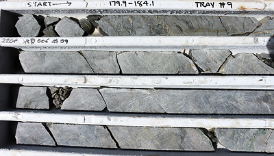 Figure 5: Great Pyramid diamond core (22GPRC006 179.9 - ~181.5m), beneath historic resource area, assay results pending. Closely sheeted chlorite-pyrite-chalcopyrite veins (± tourmaline) in strongly silicified sandstone. Historical exploration indicates that veins of this style are also cassiterite-bearing and are typical of the mineralised zones. (CNW Group/TinOne Resources Corp.)