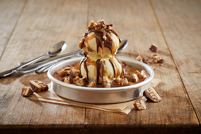 BJ's teams up with Mars to launch the SNICKERS® Pizookie®, a freshly baked brown-sugar cookie made with bits of SNICKERS® and topped with rich vanilla bean ice cream, chocolate shell topping, a drizzle of gooey caramel sauce and sprinkled with SNICKERS®. For more information, visit bjsrestaurants.com.