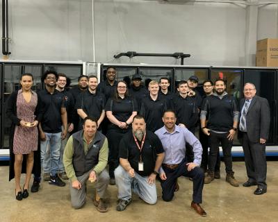 The most recent graduating class of Lincoln Tech students from the Hussmann-sponsored TechX Training Center at the school’s Grand Prairie, TX campus included the 100th graduate from the program. Over the past two years a total of 106 Lincoln students have completed the commercial HVAC/R training program and have gone on to full time technician positions with Hussmann.