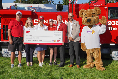CP presents CHEO Foundation with a cheque for $2.5 million. Pictured (left to right) are Steve Read, Acting President and CEO, CHEO; Dr. Jane Lougheed, Chief of Cardiology, CHEO Hospital; CP Ambassador, Lorie Kane; Aurora Amos, CP Child Ambassador for 2022 CP Women’s Open; James Clements, CP Senior Vice-President Strategic Planning & Technology Transformation; Laurence Applebaum, CEO Golf Canada; and CHEO bear. (CNW Group/Canadian Pacific)