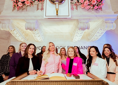 Activists Paris Hilton and Gloria Steinem sign Distinguished Guest Book.