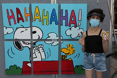 Tools of the Happiness Trade, Peanuts-Style: At The Children’s Hospital at Westmead in Sydney, Australia, patient Bella Conciatore celebrates the new Snoopy and Woodstock mural she helped paint, which will hang in the hospital as a gift from Peanuts Worldwide and the nonprofit Foundation for Hospital Art. The mural is one of 70 being donated to hospitals worldwide as part of the global “Take Care With Peanuts” initiative, launched October 2 in conjunction with the 70th Anniversary of Peanuts. (CNW Group/Peanuts Worldwide)