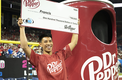 Francis P. winning the Dr Pepper Tuition Toss during halftime at the 2025 Big Ten Championship