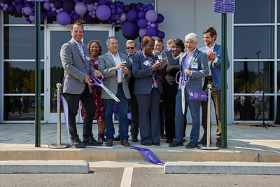 Joe Megibow, Purple CEO, and John Legg, Purple COO, with Elected Officials.