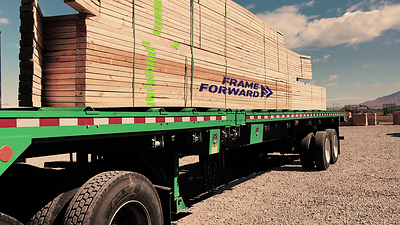 From design to delivery:  A truck loaded with Frame Forward components and featuring TrussTrax labels.