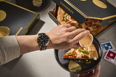 Domino's is launching a cobranded collection of Shinola favorites, including a 45mm Canfield Sport Chronograph Watch.