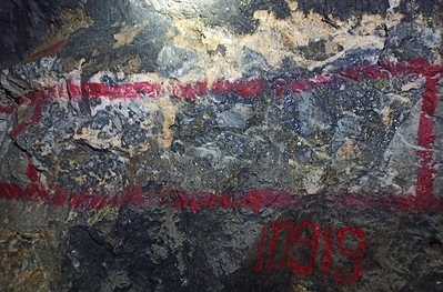 Figure 4: Example of channel sampling along the back of Sublevel 735-2, Matacaballo Vein. Image shows vein sample 10919 (part of channel CHN-43), which returned 154 g/t Ag, 11.40% Pb, 16.00% Zn, 0.37% Cu and 0.19 g/t Au over 27 cm width. Strongly brecciated vein, with abundant galena, sphalerite, and grey quartz as breccia matrix, quartz vein fragments, late quartz and rhodochrosite veining. (CNW Group/Silver Mountain Resources Inc.)